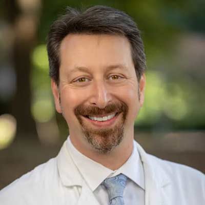 headshot of Evan Dellon