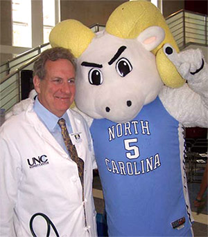 Dr. Ron Falk and UNC mascot, Ramses