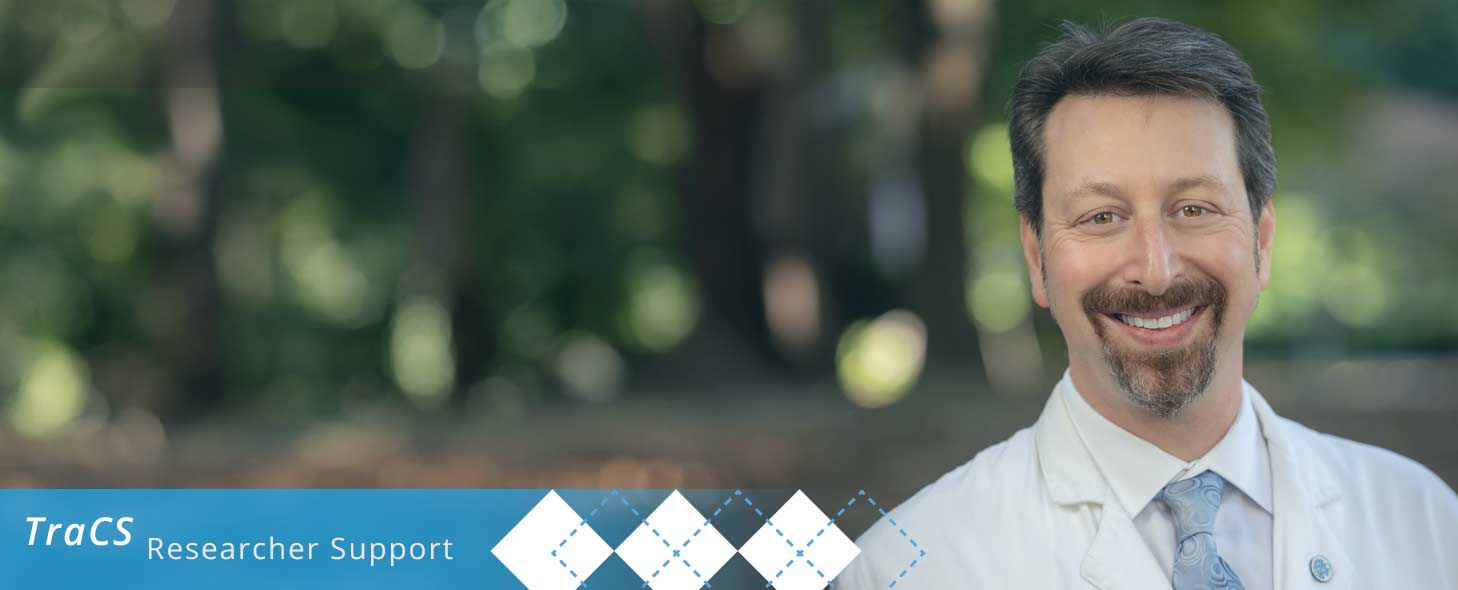 headshot of Evan Dellon