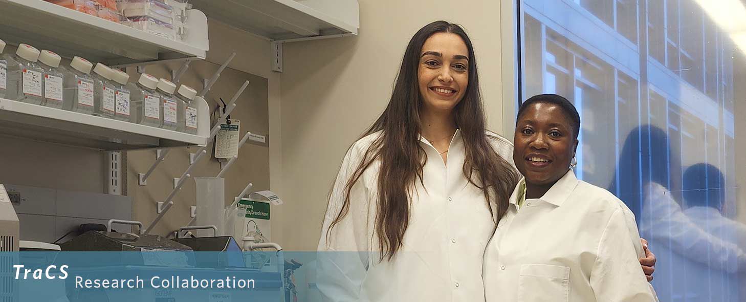 Humeyra Kaanoglu and Adebimpe Adefolaju standing together in lab